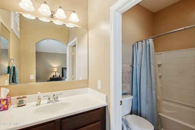 full bathroom featuring vanity, toilet, and shower / bathtub combination with curtain