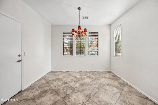 3850 E Geronimo St, Gilbert, AZ 85295 - unfurnished dining area with a chandelier and baseboards