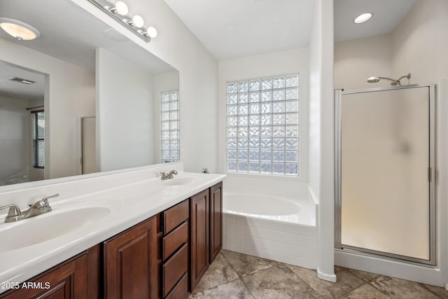 3850 E Geronimo St, Gilbert, AZ 85295 - bathroom with a garden tub, a stall shower, double vanity, and tile patterned floors
