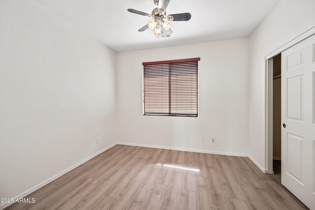 3850 E Geronimo St, Gilbert, AZ 85295 - unfurnished bedroom with light wood-style floors and ceiling fan