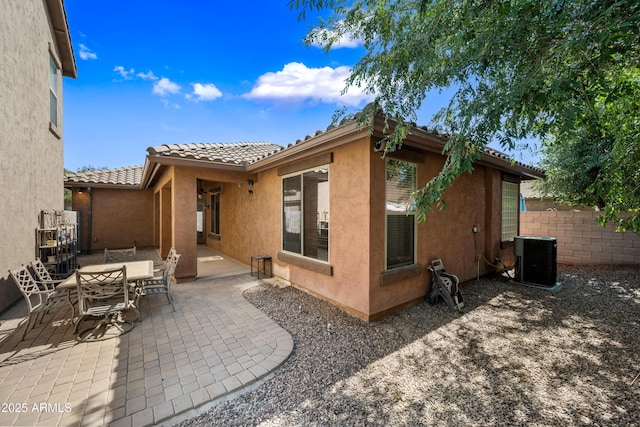 3850 E Geronimo St, Gilbert, AZ 85295 - rear view of house featuring a tile roof, stucco siding, and a patio area
