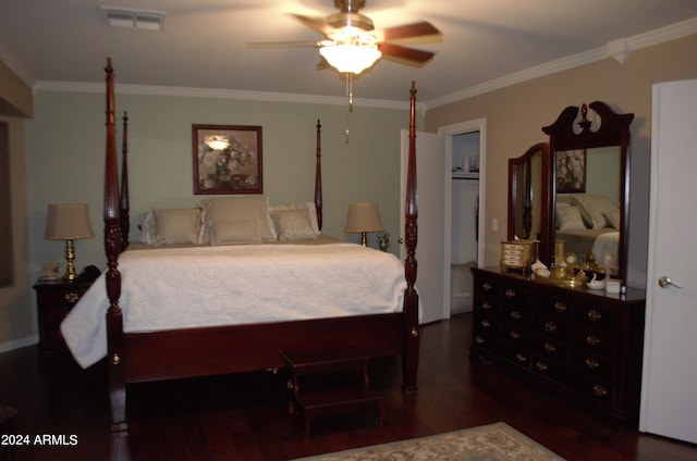 bedroom featuring crown molding, ceiling fan, and dark hardwood / wood-style floors