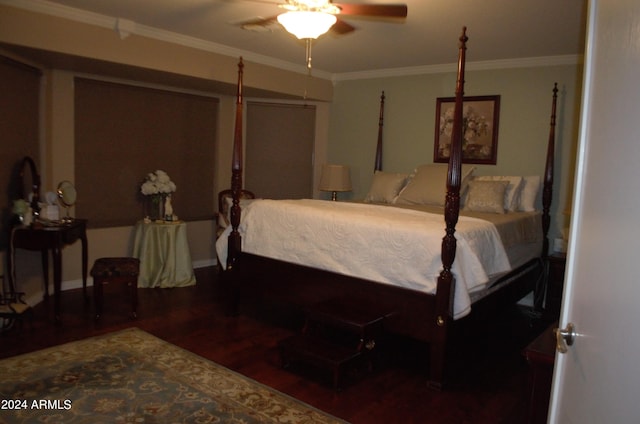 bedroom featuring dark wood-type flooring, ceiling fan, and ornamental molding