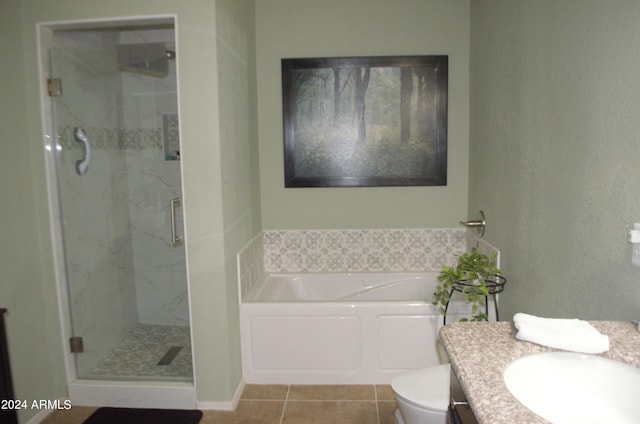 full bathroom with vanity, toilet, independent shower and bath, and tile patterned floors