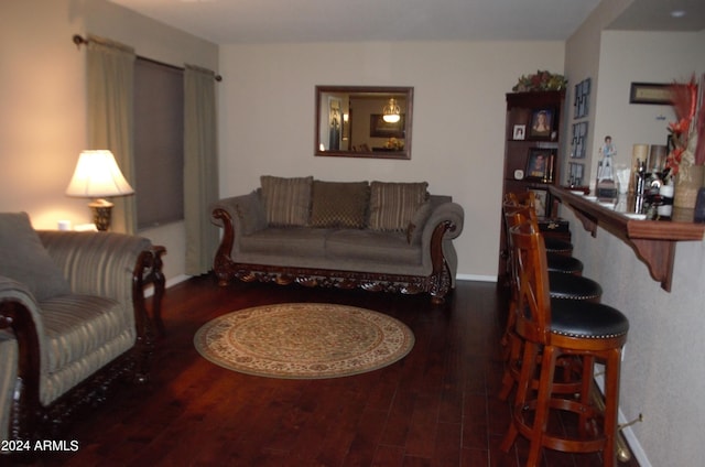 living room featuring dark hardwood / wood-style floors