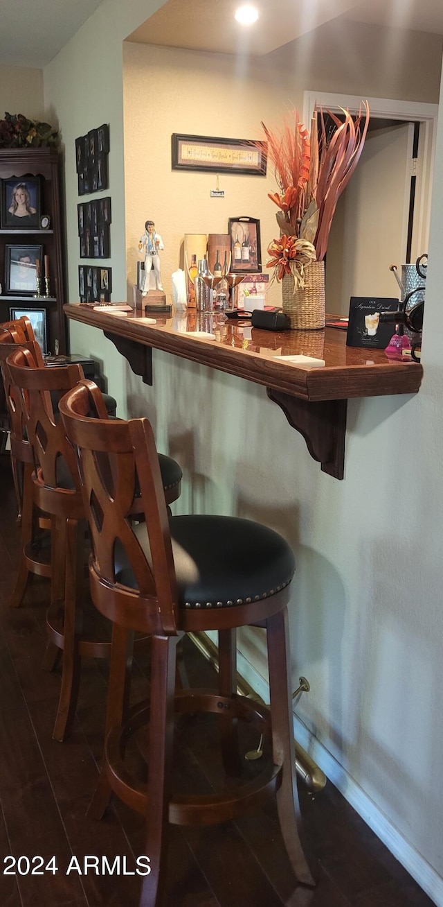 bar with dark tile patterned flooring