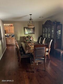 dining room featuring dark hardwood / wood-style flooring