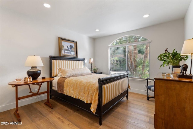 bedroom featuring wood-type flooring