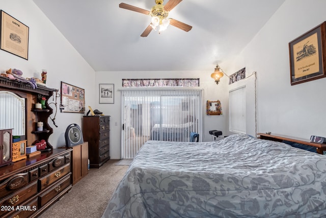 bedroom featuring ceiling fan, light colored carpet, and lofted ceiling