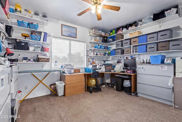 carpeted office space with ceiling fan