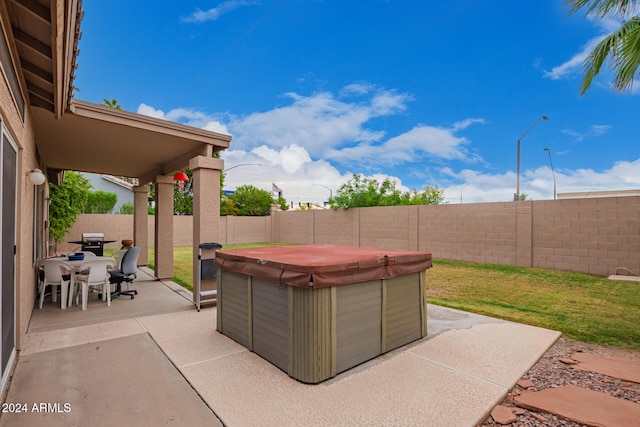 view of patio featuring a hot tub