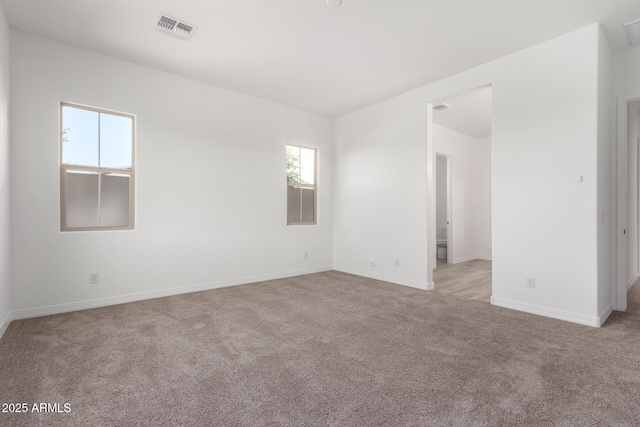 11660 W Luxton Ln, Avondale, AZ 85323 - spare room with carpet and baseboards