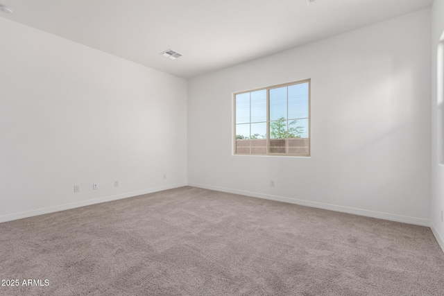 11660 W Luxton Ln, Avondale, AZ 85323 - carpeted empty room with baseboards and a smoke detector
