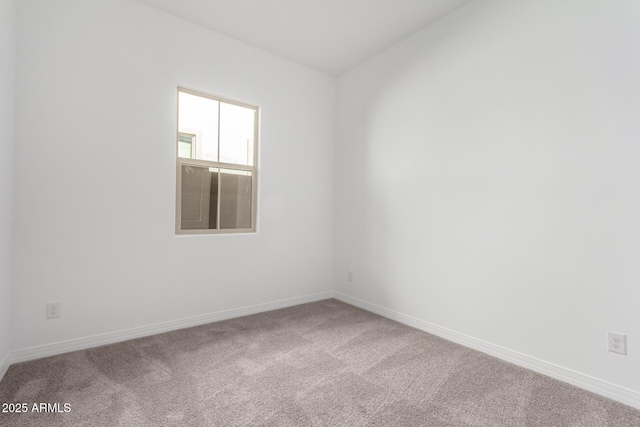 11660 W Luxton Ln, Avondale, AZ 85323 - carpeted empty room featuring baseboards