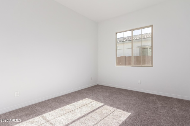 11660 W Luxton Ln, Avondale, AZ 85323 - carpeted spare room featuring baseboards