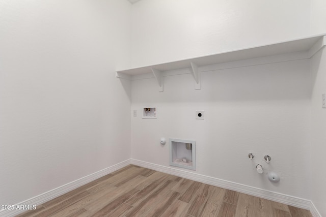 11660 W Luxton Ln, Avondale, AZ 85323 - laundry area with hookup for a gas dryer, light wood-type flooring, hookup for a washing machine, baseboards, and hookup for an electric dryer
