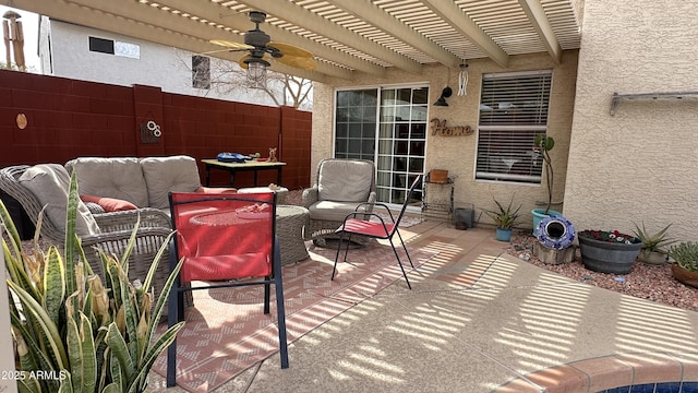 view of patio featuring ceiling fan and a pergola