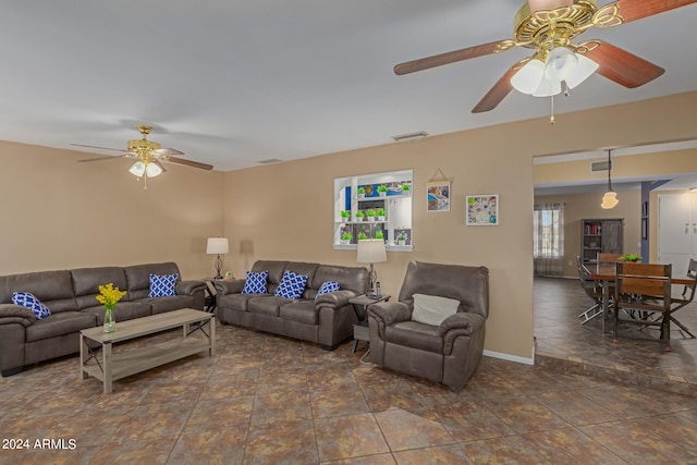 living room featuring ceiling fan