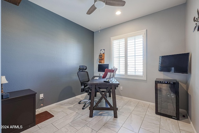 office area with ceiling fan