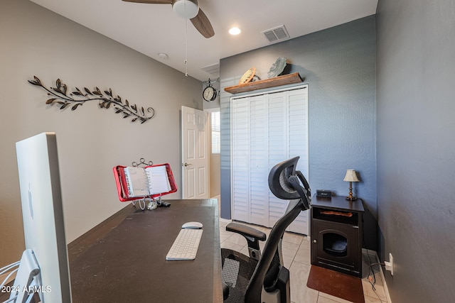 office area with ceiling fan and light tile patterned floors