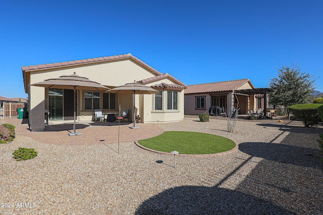 rear view of property with a patio