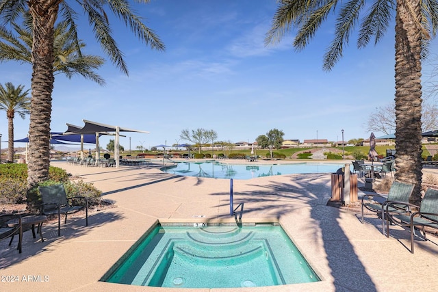 view of swimming pool featuring a patio