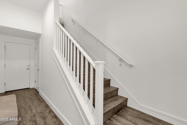 6565 E Thomas Rd Unit 1096, Scottsdale, AZ 85251 - stairway featuring wood finished floors and baseboards