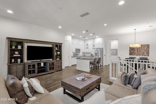 6565 E Thomas Rd Unit 1096, Scottsdale, AZ 85251 - living area with wood finished floors and recessed lighting