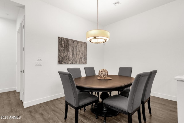 6565 E Thomas Rd Unit 1096, Scottsdale, AZ 85251 - dining room with wood finished floors and baseboards