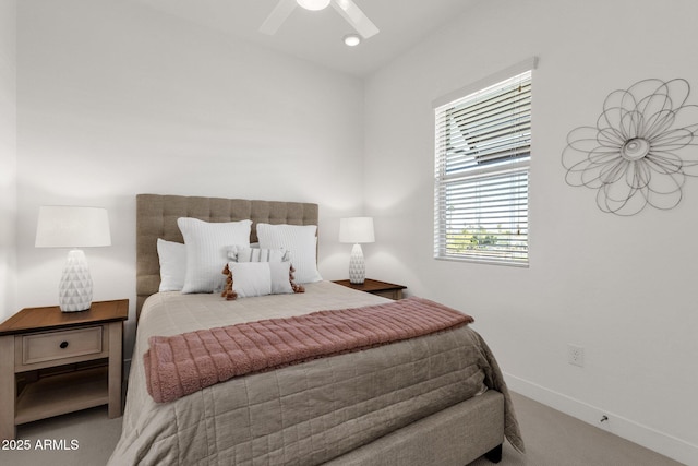 6565 E Thomas Rd Unit 1096, Scottsdale, AZ 85251 - carpeted bedroom with baseboards and a ceiling fan