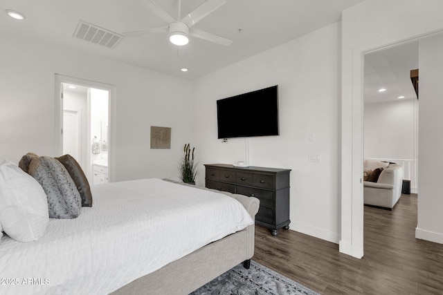 6565 E Thomas Rd Unit 1096, Scottsdale, AZ 85251 - bedroom featuring dark wood finished floors, baseboards, recessed lighting, ensuite bath, and ceiling fan