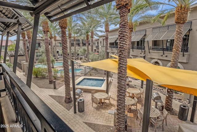 6565 E Thomas Rd Unit 1096, Scottsdale, AZ 85251 - view of patio / terrace featuring a hot tub and a community pool