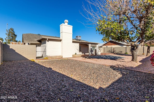 back of property with a patio area