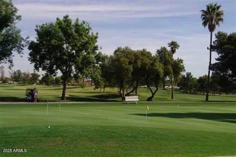 view of community with golf course view