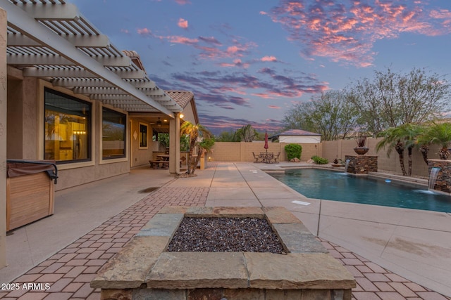 view of pool featuring a fenced in pool, a fenced backyard, a pergola, and a patio area