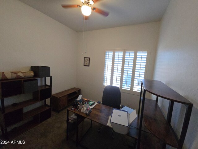 office featuring dark carpet and ceiling fan