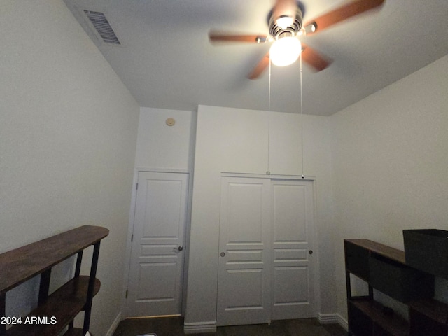 bedroom featuring a closet and ceiling fan