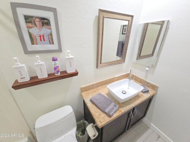 bathroom with toilet and sink