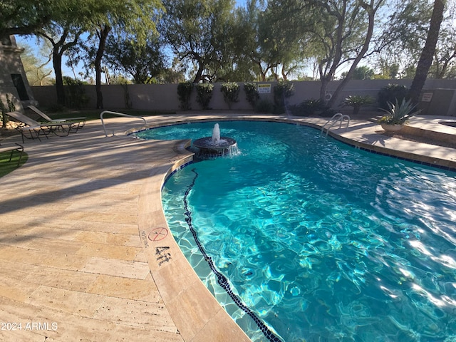 view of pool with a patio area