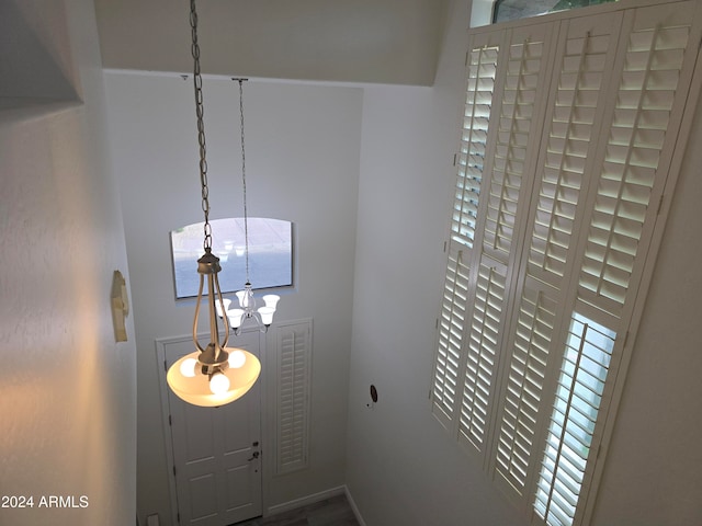 interior space featuring a chandelier