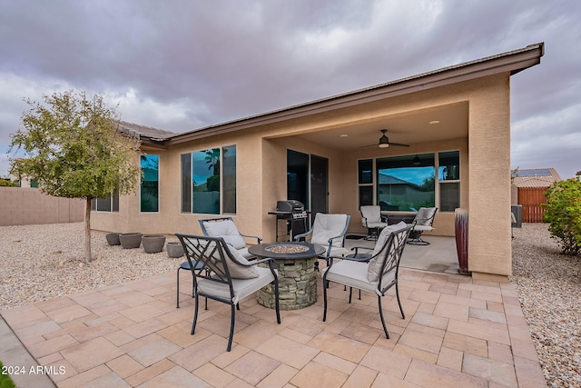 view of patio featuring ceiling fan and grilling area