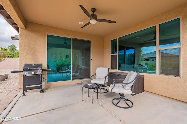 view of patio featuring grilling area and ceiling fan