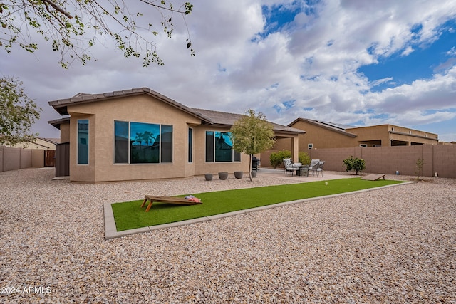 rear view of property with a patio