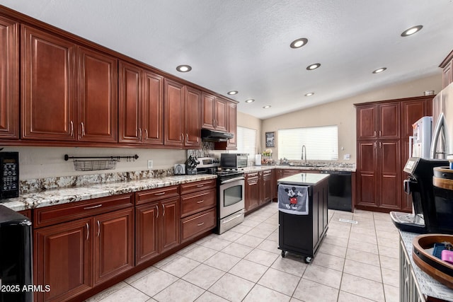 kitchen with lofted ceiling, sink, a center island, light stone counters, and black appliances