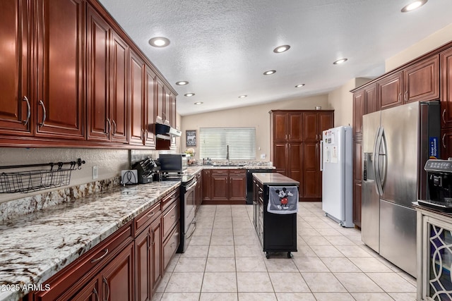 kitchen with vaulted ceiling, electric range oven, sink, white refrigerator, and stainless steel refrigerator with ice dispenser