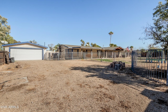 view of yard with a garage