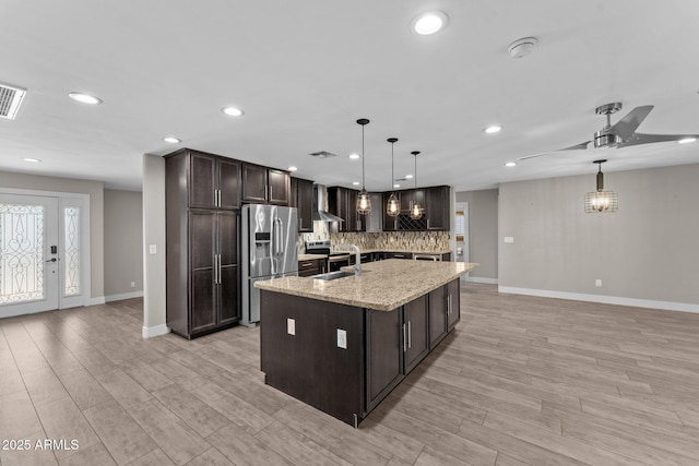 4602 W Monte Cristo Ave, Glendale, AZ 85306 - kitchen with appliances with stainless steel finishes, a sink, dark brown cabinetry, recessed lighting, and baseboards