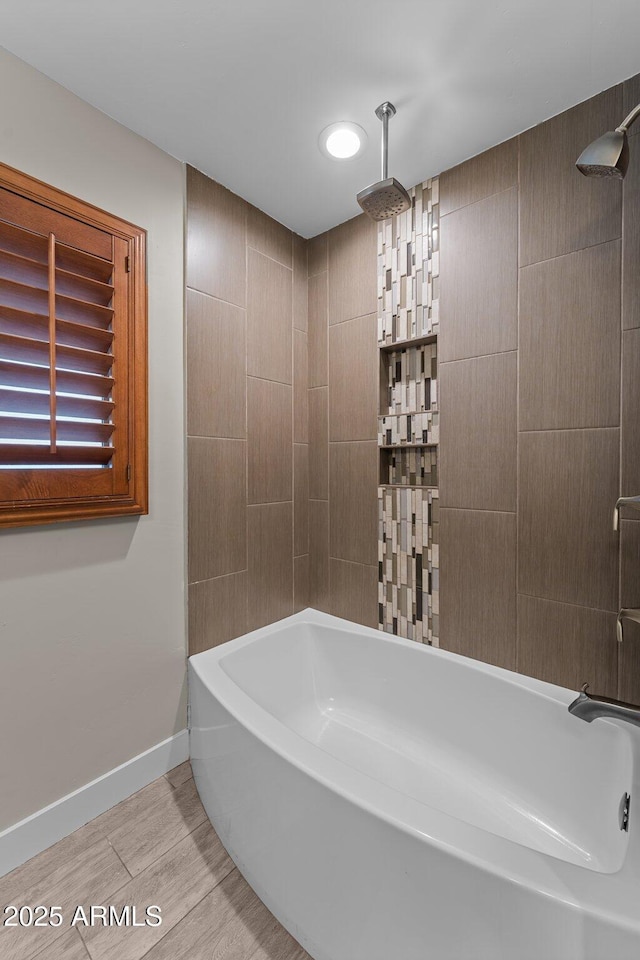 4602 W Monte Cristo Ave, Glendale, AZ 85306 - full bath featuring a combined bath / shower with rainfall shower, wood finished floors, and baseboards