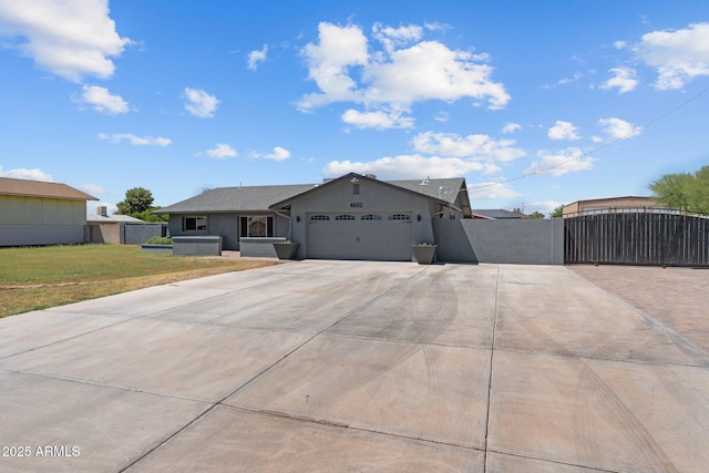 4602 W Monte Cristo Ave, Glendale, AZ 85306 - single story home with a gate, driveway, a garage, and stucco siding