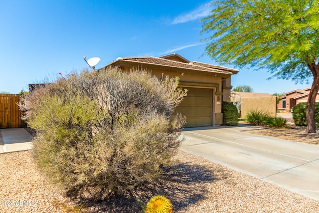 view of front of home with a garage